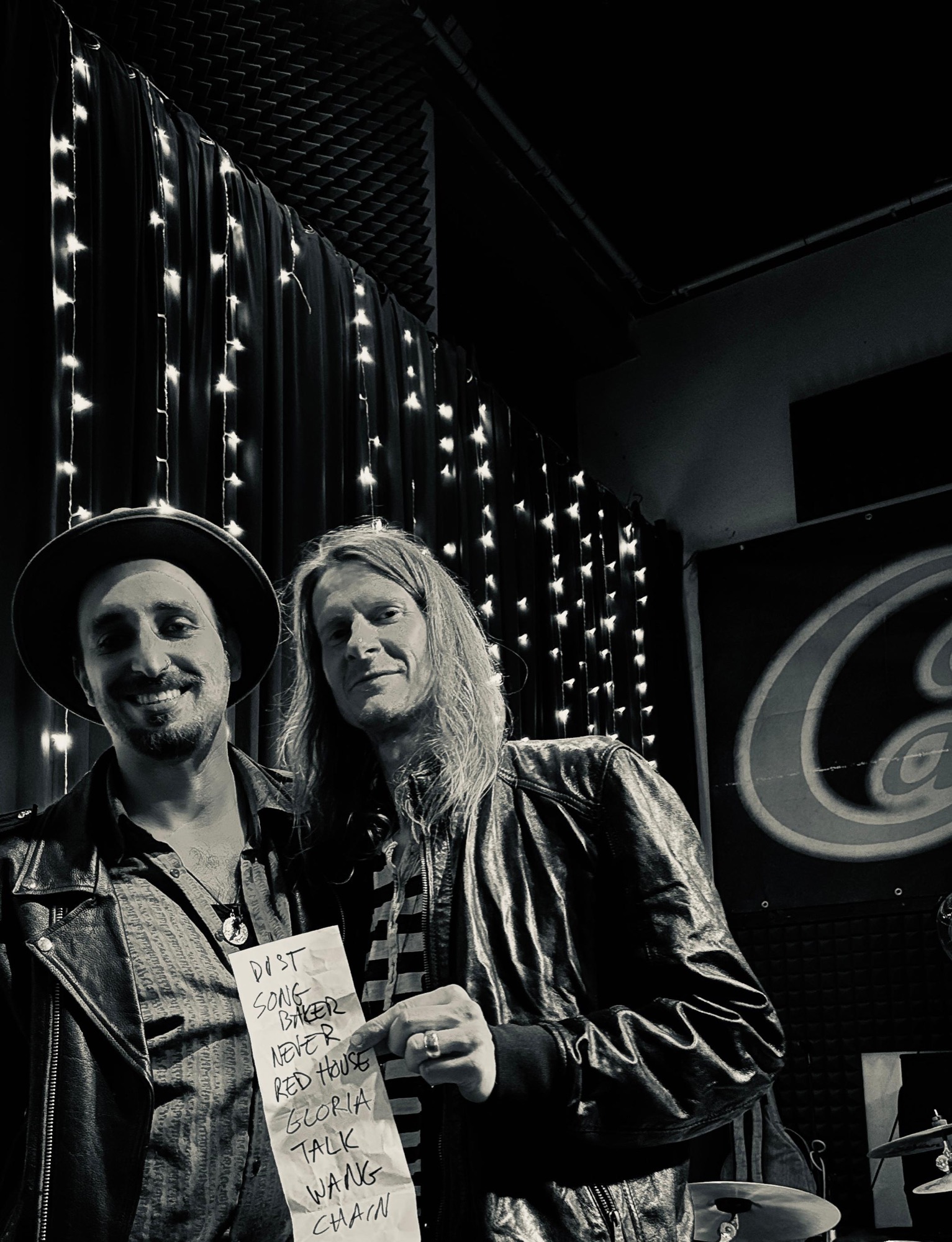 The Drags performing live, Café Carina promo graphic